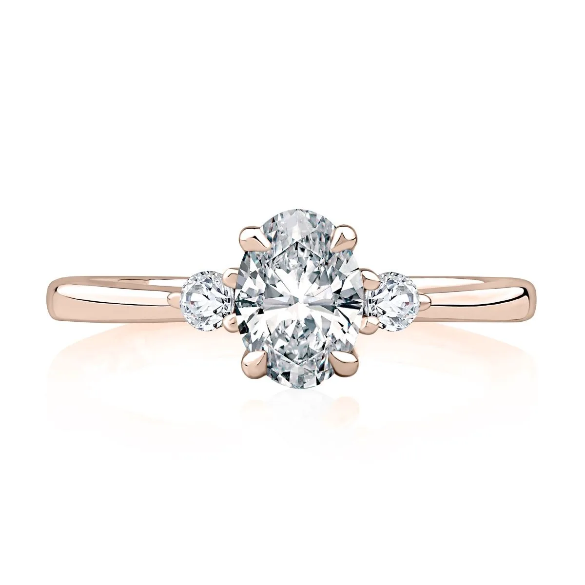 Three Stone Oval Cut Engagement Ring With Round Side Diamonds, photograph 8