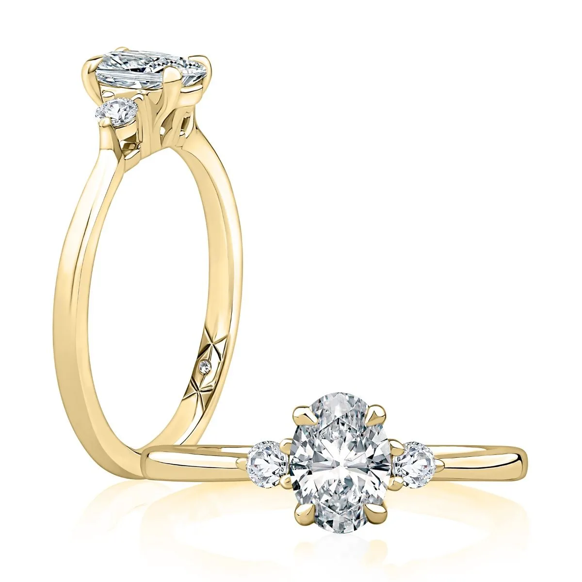 Three Stone Oval Cut Engagement Ring With Round Side Diamonds, photograph 4