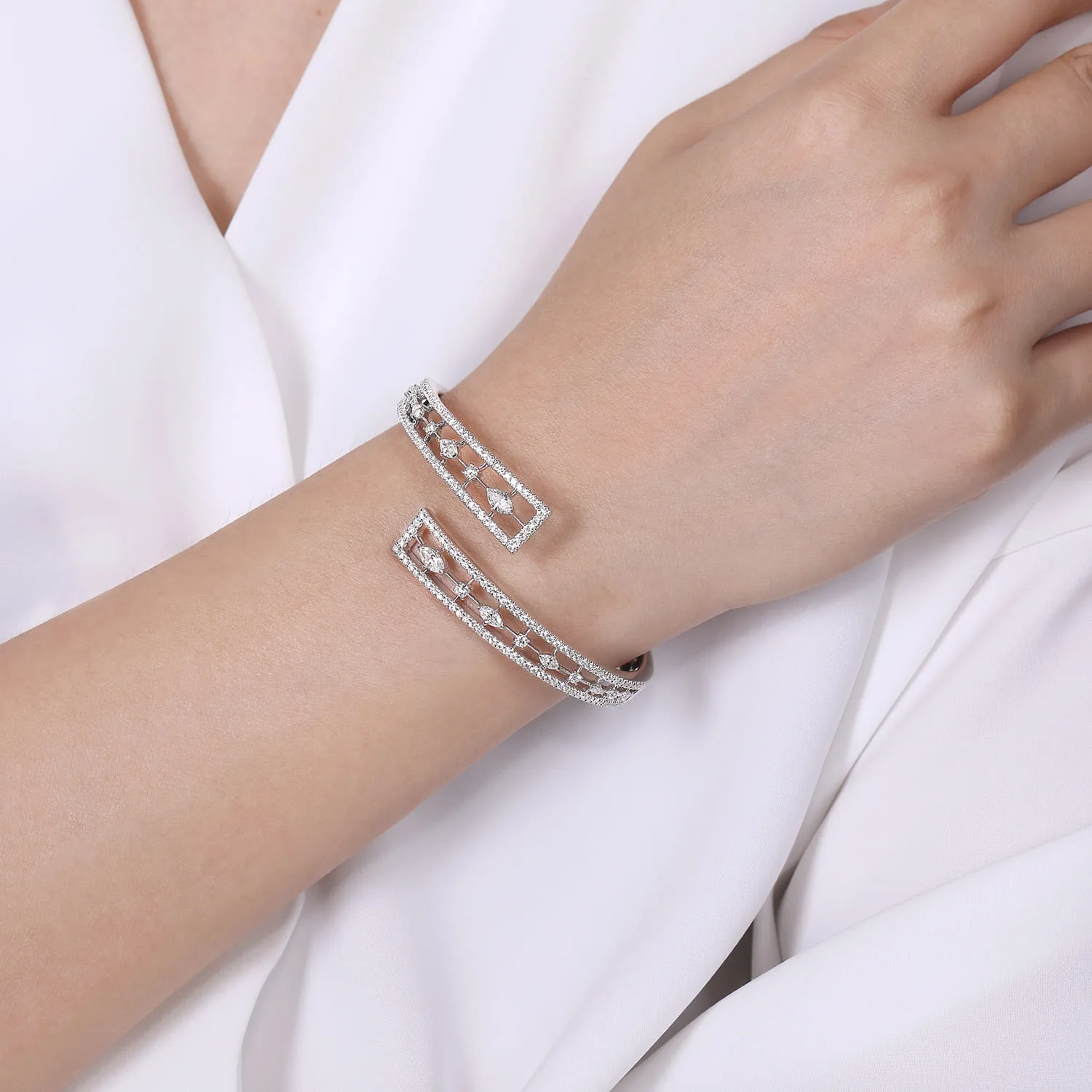 Diamond Pave Bypass Bangle with Geometric Stations in 18K White Gold, photograph 4