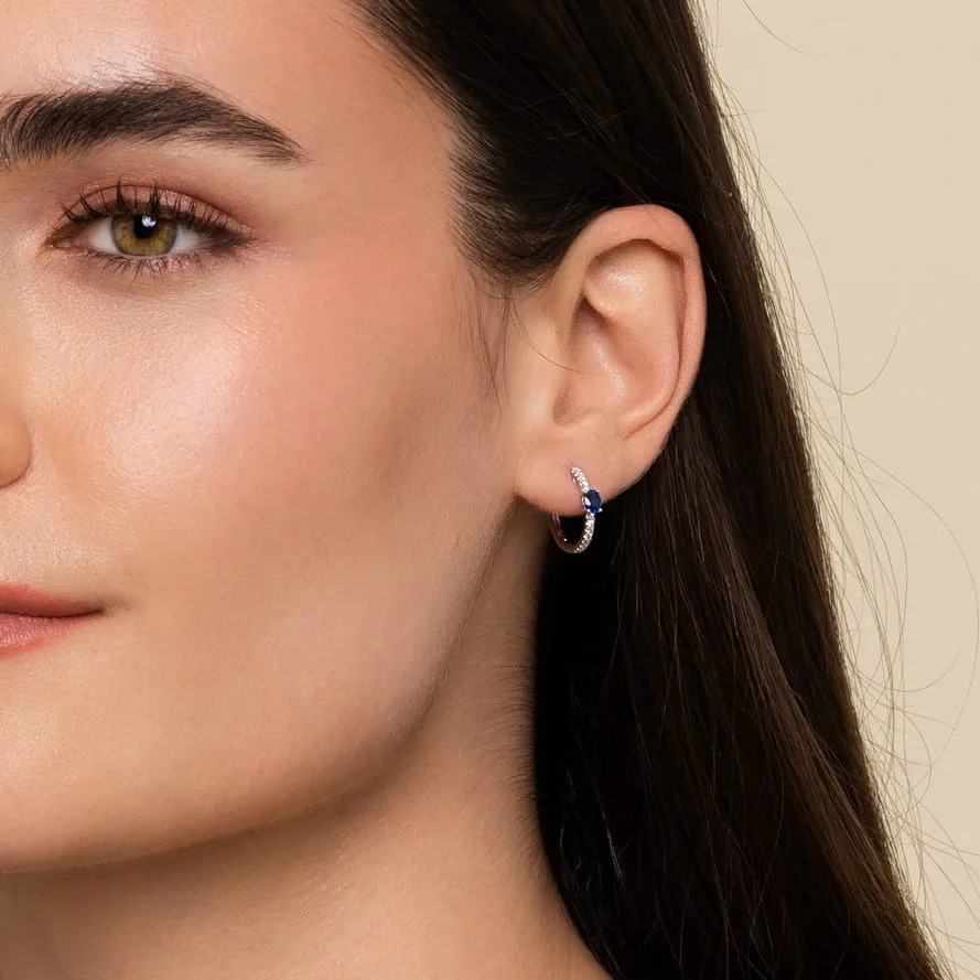 15mm Diamond and Single Sapphire Huggie Earrings in 14K White Gold, photograph 2