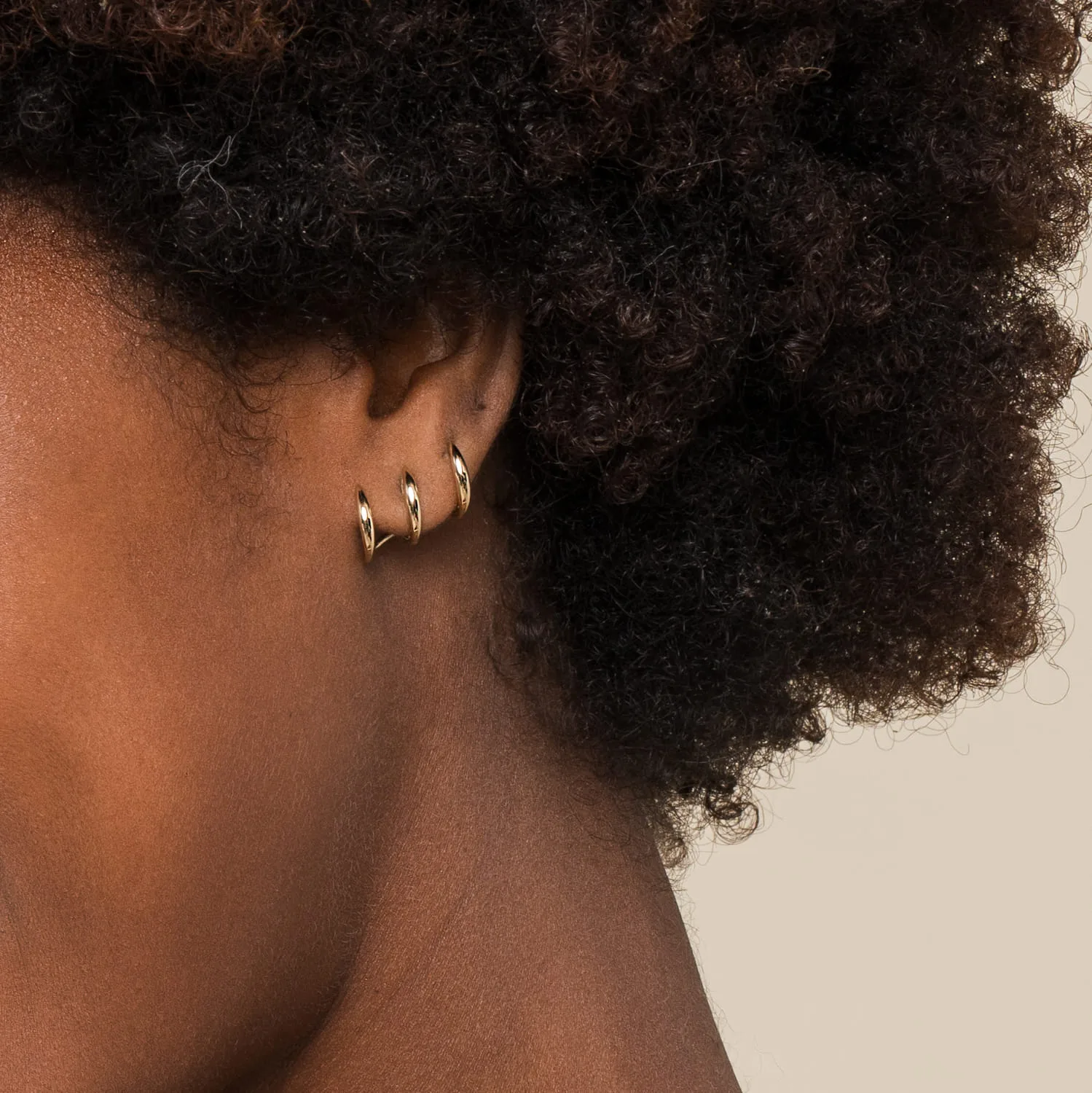 Curving Three Row Stud Earrings in 14K Yellow Gold, photograph 3