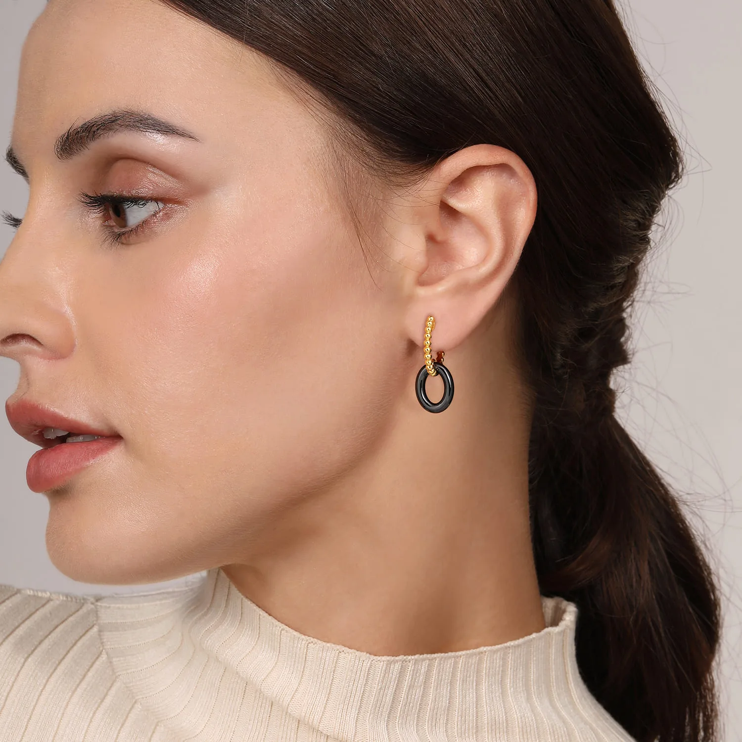 Black Ceramic Bujukan Huggie Drop Earrings in 14K Yellow Gold, photograph 2