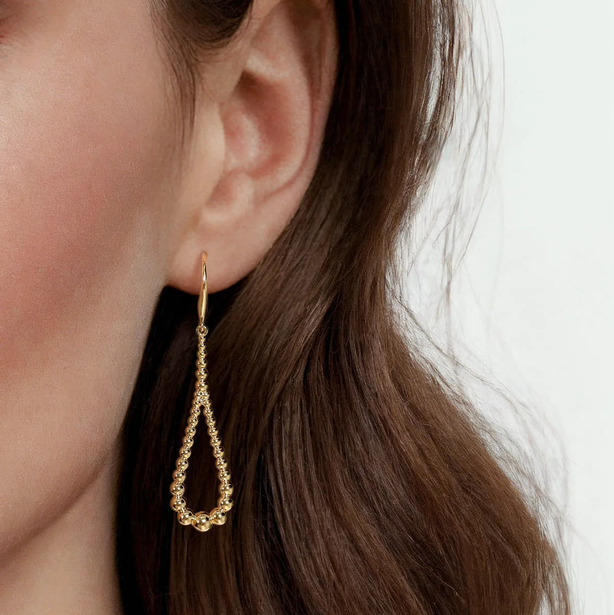 Bujukan Teardrop Earrings in 14K Yellow Gold, photograph 4