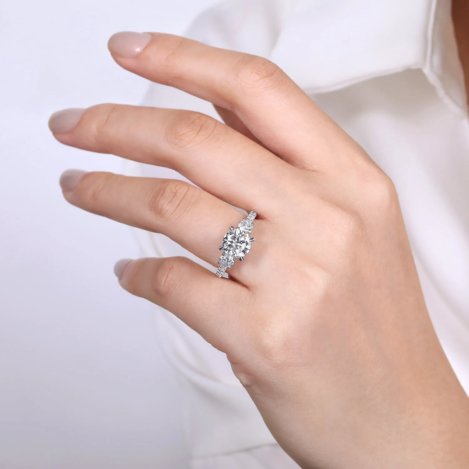 Round 3 Stone Diamond Engagement Ring in 18K White Gold, photograph 6