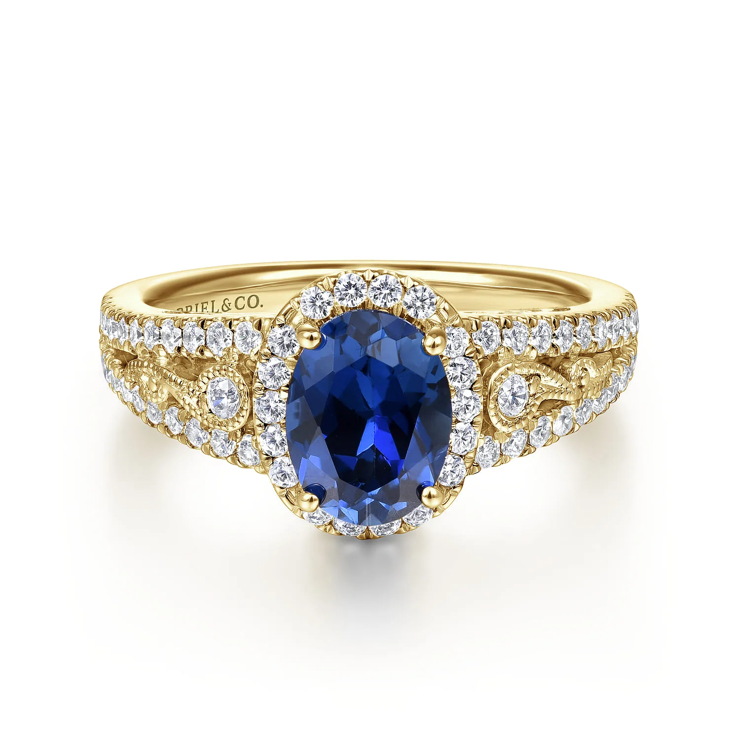 Oval Halo Sapphire and Diamond Engagement Ring
