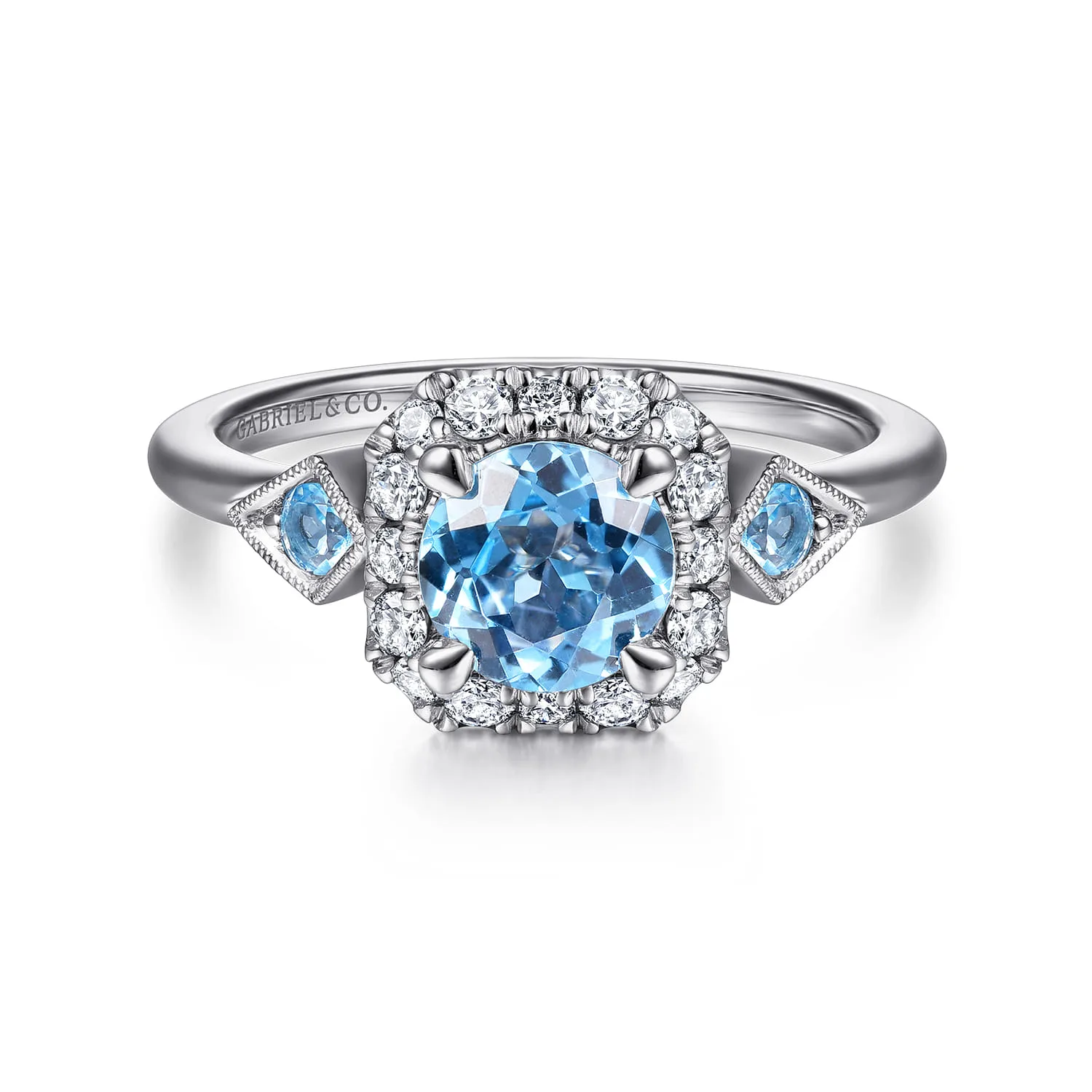 Three Stone Blue Topaz and Diamond Halo Ring