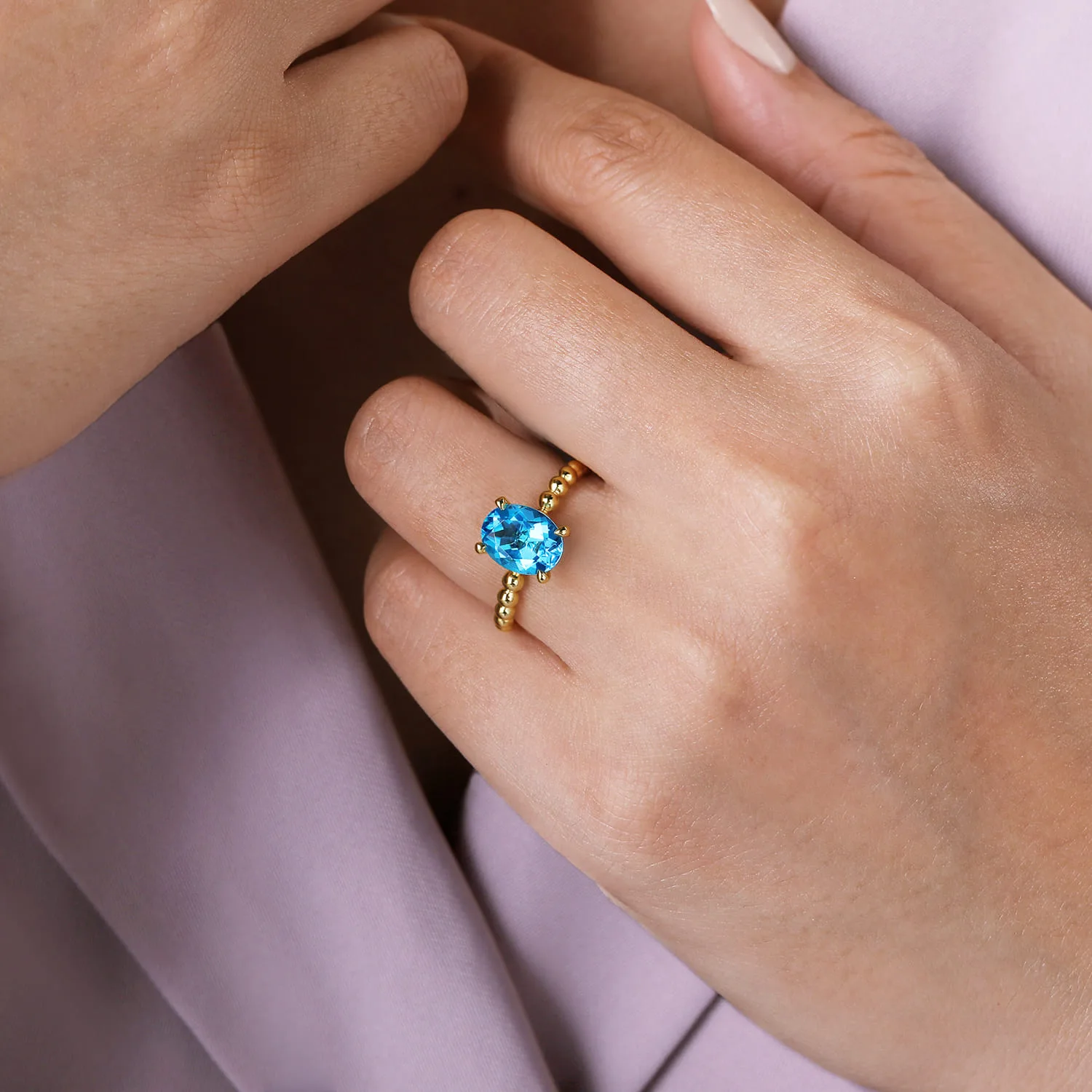 Bujukan Oval Swiss Blue Topaz Bujukan Promise Ring in 14K Yellow Gold, photograph 5