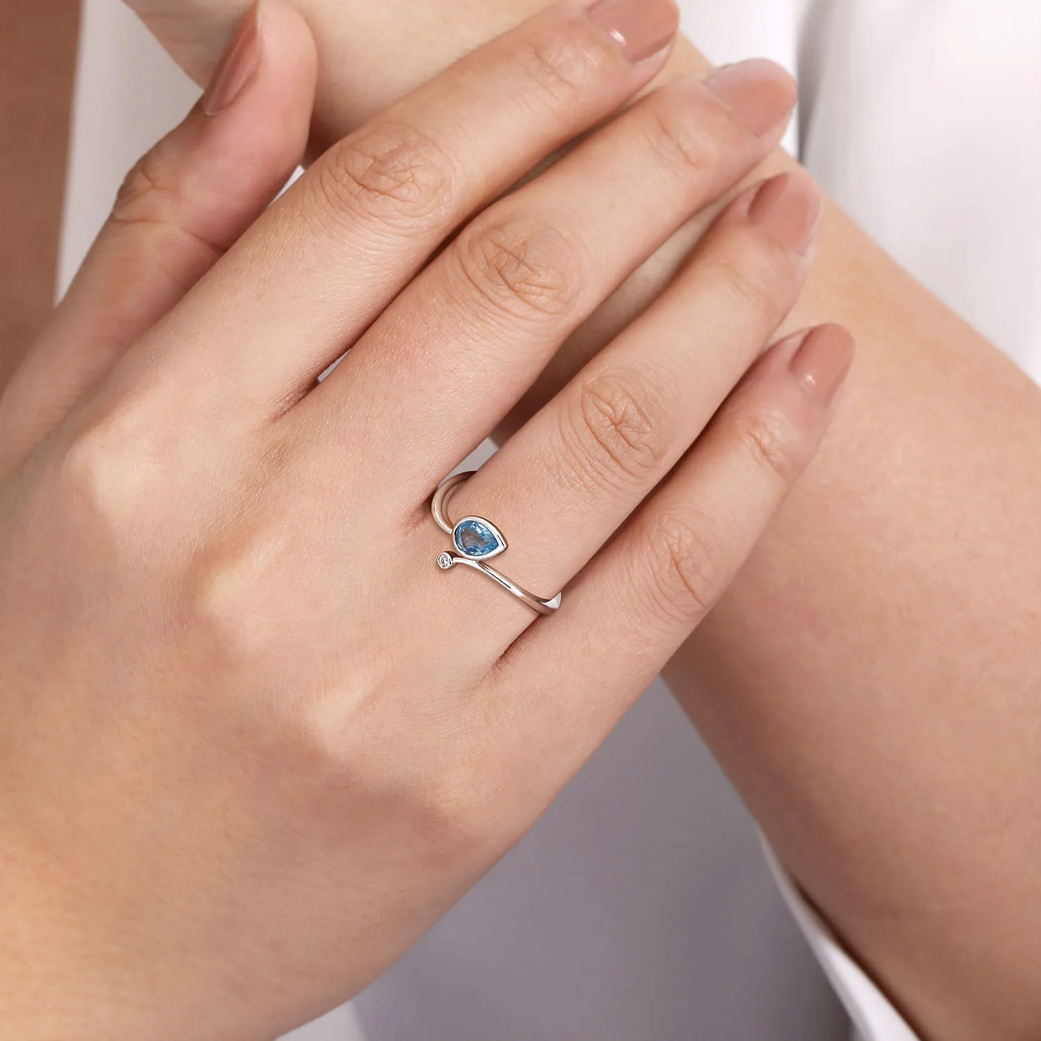 Diamond and Blue Topaz Teardrop Bypass Ring in Sterling Silver, photograph 5