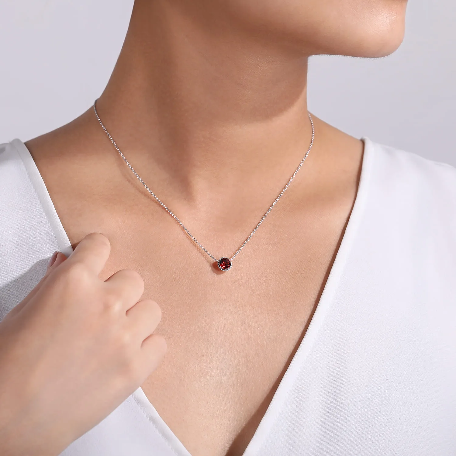 Round Garnet and Diamond Halo Pendant Necklace in 14K White Gold, photograph 3