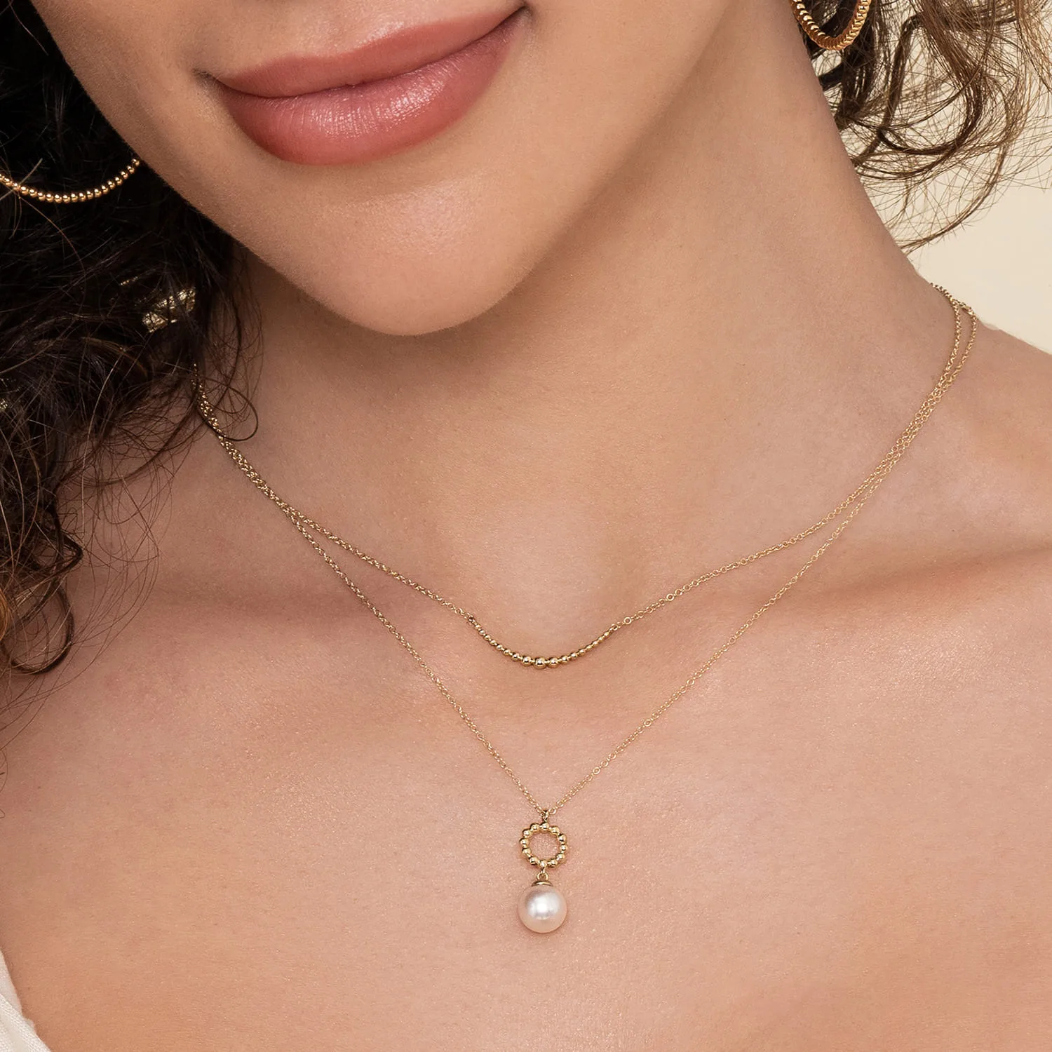Graduating Bujukan Beads Curved Bar Necklace in 14K Yellow Gold, photograph 4