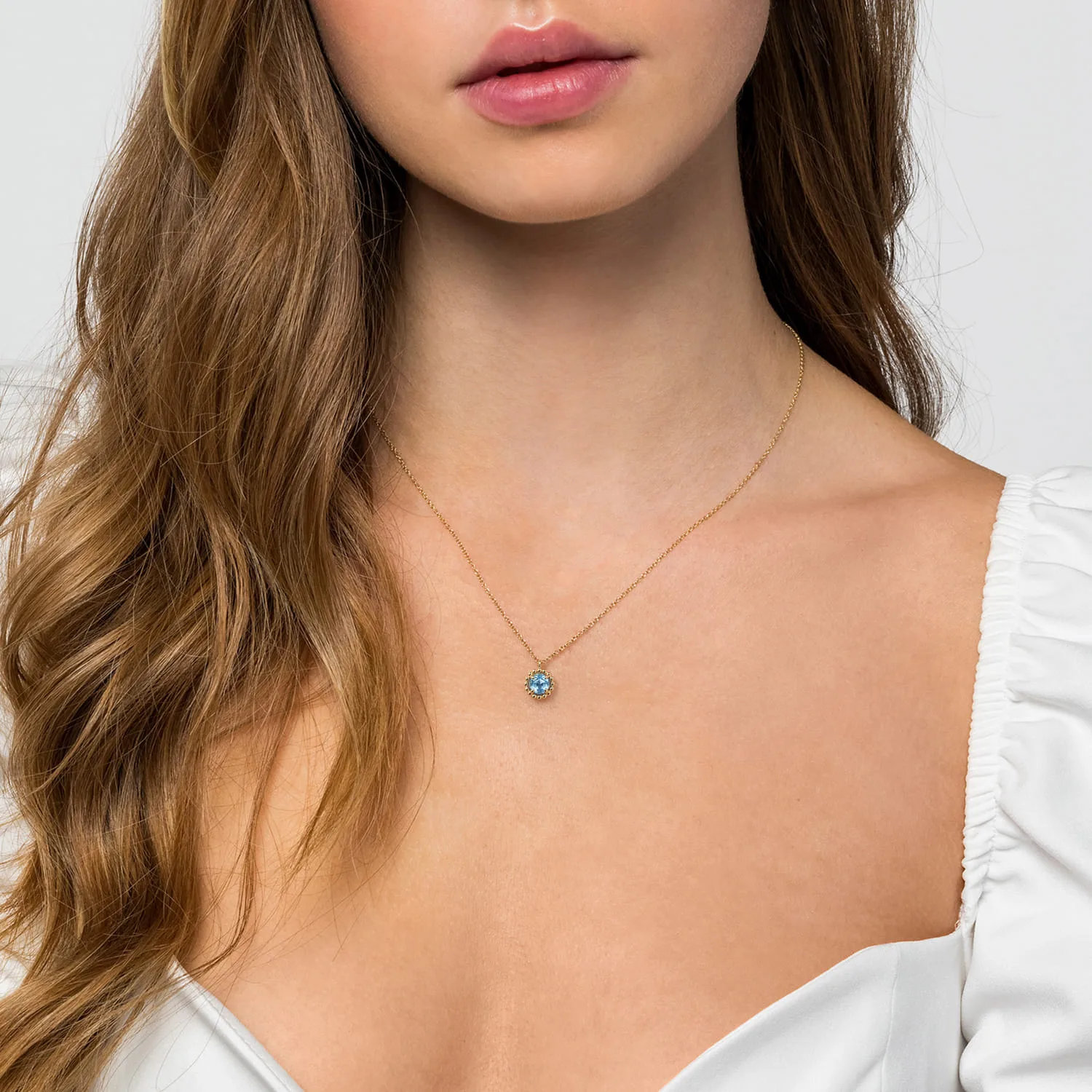 Bujukan Blue Topaz Pendant Necklace in 14K Yellow Gold, photograph 3