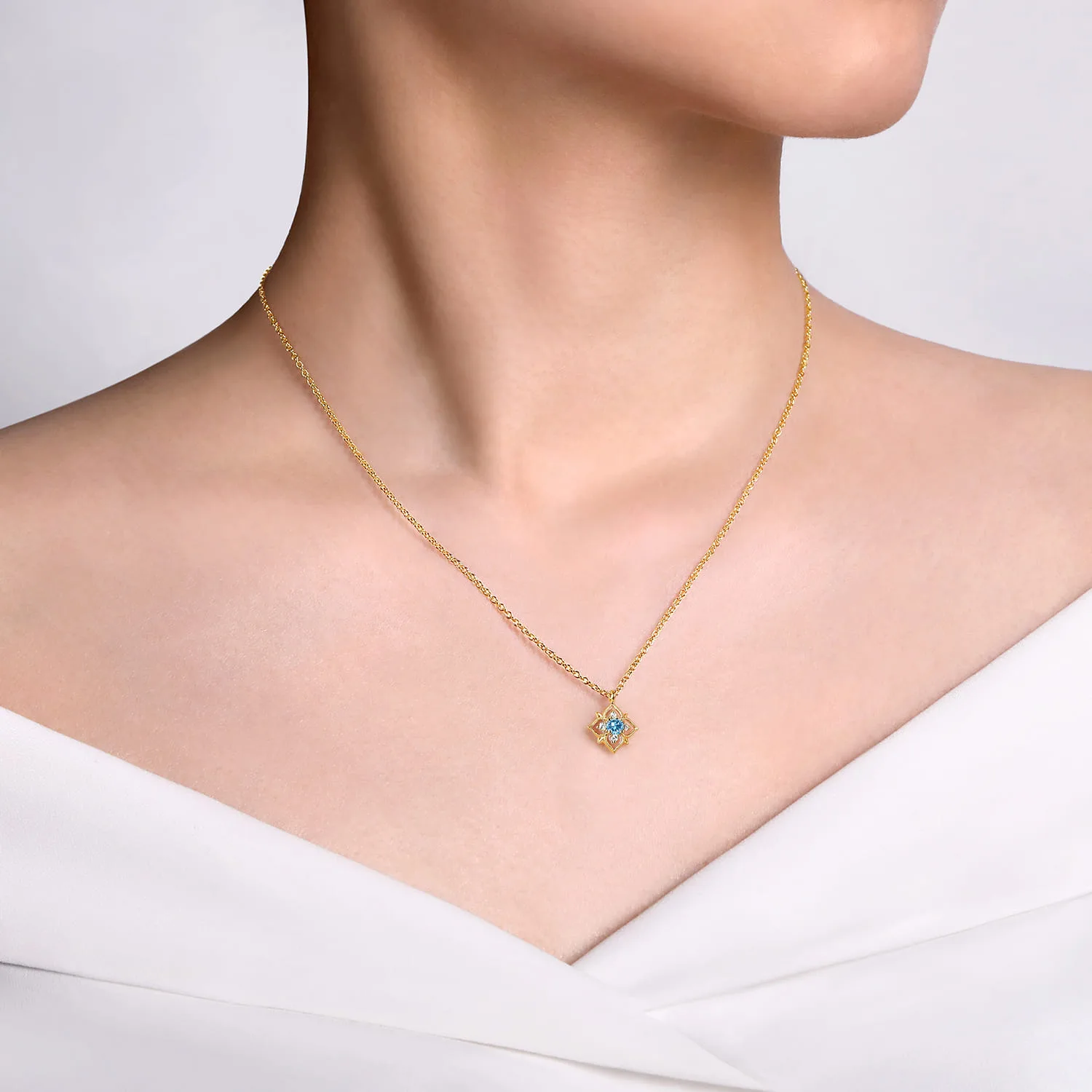Swiss Blue Topaz and Diamond Floral Pendant Necklace in 14K Yellow Gold, photograph 3