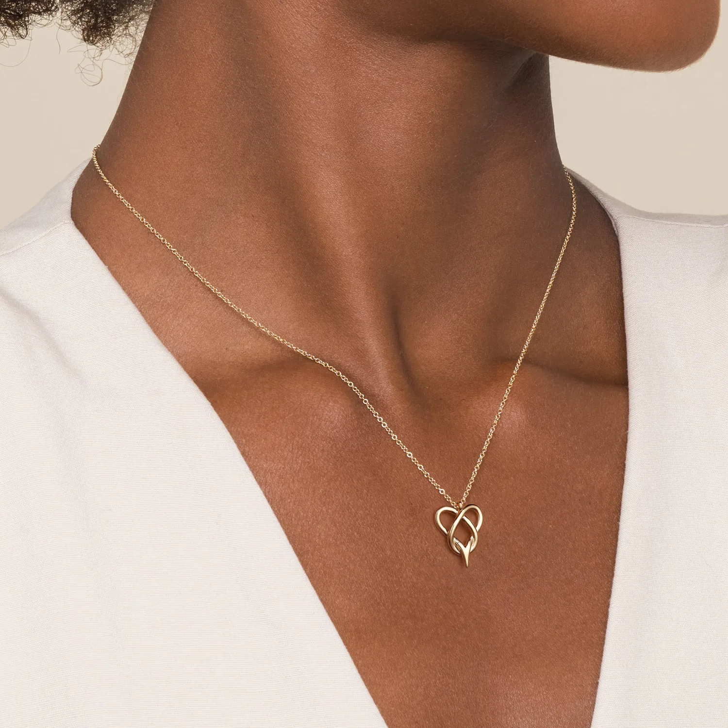Infinity Pendant Necklace in 14K Yellow Gold, photograph 3