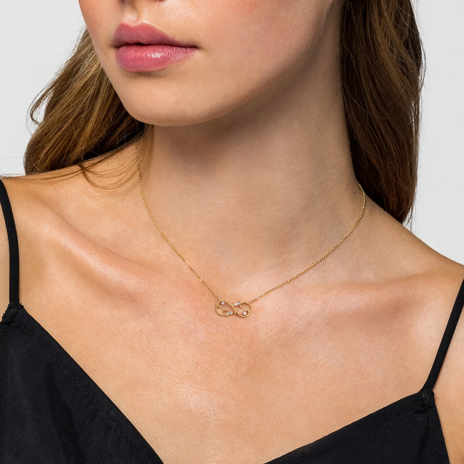 Diamond Infinity Floral Necklace in 14K Yellow Gold, photograph 3
